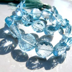 Shop Topaz Faceted Beads! Sky Blue topaz coins • 8-9-10mm • Pairs available • AAA micro faceted • Genuine natural gemstone • December birthstone • Flat disc rondelles | Natural genuine faceted Topaz beads for beading and jewelry making.  #jewelry #beads #beadedjewelry #diyjewelry #jewelrymaking #beadstore #beading #affiliate #ad