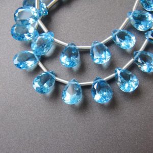Shop Topaz Beads! Swiss Blue Topaz Concave Pear Drops • 10x7mm • AAA+ Selected Beads • Bright Neon Blue • Natural Gemstone • Pairs Available | Natural genuine beads Topaz beads for beading and jewelry making.  #jewelry #beads #beadedjewelry #diyjewelry #jewelrymaking #beadstore #beading #affiliate #ad