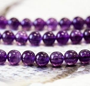 Shop Amethyst Round Beads! M/ Amethyst 7mm Smooth Round Loose Beads 15.5" strand Purple quartz smooth sphere for jewelry making | Natural genuine round Amethyst beads for beading and jewelry making.  #jewelry #beads #beadedjewelry #diyjewelry #jewelrymaking #beadstore #beading #affiliate #ad