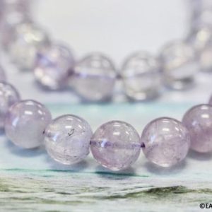 Shop Amethyst Round Beads! M/ Cape Amethyst 10mm/ 12mm Smooth Round Loose Beads 16" strand Pale Purple quartz gemstone beads For jewelry making | Natural genuine round Amethyst beads for beading and jewelry making.  #jewelry #beads #beadedjewelry #diyjewelry #jewelrymaking #beadstore #beading #affiliate #ad