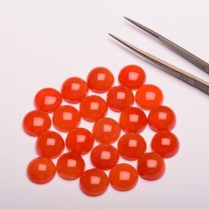 Shop Carnelian Cabochons! Carnelian cabochon 12mm rounds 1st quality | Natural genuine stones & crystals in various shapes & sizes. Buy raw cut, tumbled, or polished gemstones for making jewelry or crystal healing energy vibration raising reiki stones. #crystals #gemstones #crystalhealing #crystalsandgemstones #energyhealing #affiliate #ad