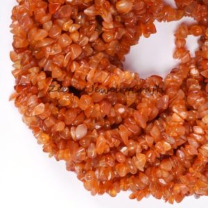 Shop Carnelian Chip & Nugget Beads! Carnelian Smooth Uncut Chips Gemstone Beads Loose Beads 34" Natural Orange Carnelian Nugget Uncut Jewelry Necklace Carnelian Jewelry Crafts | Natural genuine chip Carnelian beads for beading and jewelry making.  #jewelry #beads #beadedjewelry #diyjewelry #jewelrymaking #beadstore #beading #affiliate #ad
