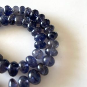 Shop Iolite Rondelle Beads! Iolite Rondelle Beads, Iolite Smooth Rondelle Beads, 7mm to 12mm Beads, Sold As 13 Inch Strand, GDS2155 | Natural genuine rondelle Iolite beads for beading and jewelry making.  #jewelry #beads #beadedjewelry #diyjewelry #jewelrymaking #beadstore #beading #affiliate #ad
