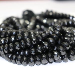 Shop Black Tourmaline Rondelle Beads! Natural Black Tourmaline Faceted Rondelle Beads  12mm Black Tourmaline Beads   Black Tourmaline Rondelle beads   Wholesale Beads | Natural genuine rondelle Black Tourmaline beads for beading and jewelry making.  #jewelry #beads #beadedjewelry #diyjewelry #jewelrymaking #beadstore #beading #affiliate #ad