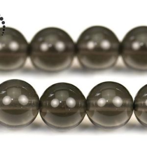 Shop Obsidian Round Beads! Ice Obsidian smooth round beads,6mm 8mm 10mm 12mm for Choice,15" full strand | Natural genuine round Obsidian beads for beading and jewelry making.  #jewelry #beads #beadedjewelry #diyjewelry #jewelrymaking #beadstore #beading #affiliate #ad