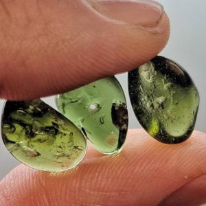 Shop Moldavite Beads! ONE Polished Moldavite Bead – 1 GRAM – Drilled for Jewelry from Czech Republic – "The Stone of Transformation" – 100% Genuine and Authentic | Natural genuine other-shape Moldavite beads for beading and jewelry making.  #jewelry #beads #beadedjewelry #diyjewelry #jewelrymaking #beadstore #beading #affiliate #ad