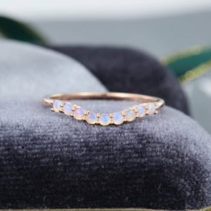 Opal wedding band women Solid 14K Rose gold Unique Curved wedding band vintage stacking matching Bridal set Promise Anniversary Gift for her | Natural genuine Opal rings, simple unique alternative gemstone engagement rings. #rings #jewelry #bridal #wedding #jewelryaccessories #engagementrings #weddingideas #affiliate #ad