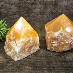 Shop Orange Calcite Points & Wands! Vibrant Energy in Handcrafted Orange Calcite Gemstone Points | Natural genuine stones & crystals in various shapes & sizes. Buy raw cut, tumbled, or polished gemstones for making jewelry or crystal healing energy vibration raising reiki stones. #crystals #gemstones #crystalhealing #crystalsandgemstones #energyhealing #affiliate #ad