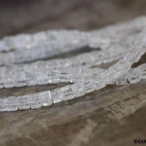 Shop Quartz Crystal Bead Shapes! S/ Cracked Crystal 4x4mm Cube beads 16" strand Grade A+ Nice quality clear quartz gemstone beads for jewelry making | Natural genuine other-shape Quartz beads for beading and jewelry making.  #jewelry #beads #beadedjewelry #diyjewelry #jewelrymaking #beadstore #beading #affiliate #ad