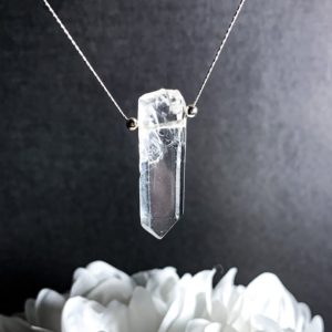 Raw Quartz Crystal Point Pendant Necklace in Sterling Silver | Natural genuine Gemstone pendants. Buy crystal jewelry, handmade handcrafted artisan jewelry for women.  Unique handmade gift ideas. #jewelry #beadedpendants #beadedjewelry #gift #shopping #handmadejewelry #fashion #style #product #pendants #affiliate #ad