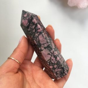 Shop Rhodonite Points & Wands! Rhodonite Tower, Rhodonite Point, Top Quality Rhodonite | Natural genuine stones & crystals in various shapes & sizes. Buy raw cut, tumbled, or polished gemstones for making jewelry or crystal healing energy vibration raising reiki stones. #crystals #gemstones #crystalhealing #crystalsandgemstones #energyhealing #affiliate #ad