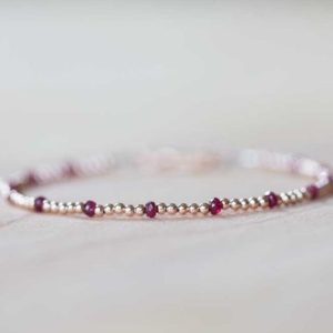 Dainty Rose Gold Fill Beaded Bracelet with Ruby, Skinny Beaded Stacking Jewelry, Sterling Silver July Birthstone | Natural genuine Ruby bracelets. Buy crystal jewelry, handmade handcrafted artisan jewelry for women.  Unique handmade gift ideas. #jewelry #beadedbracelets #beadedjewelry #gift #shopping #handmadejewelry #fashion #style #product #bracelets #affiliate #ad