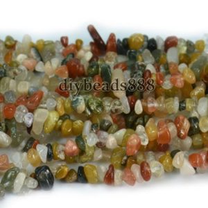 Shop Rutilated Quartz Chip & Nugget Beads! 35 inch full strand natural Mixed color Rutilated Quartz chips beads,Irregular beads 5-8mm | Natural genuine chip Rutilated Quartz beads for beading and jewelry making.  #jewelry #beads #beadedjewelry #diyjewelry #jewelrymaking #beadstore #beading #affiliate #ad