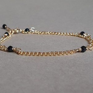 Shop Spinel Bracelets! Black spinel double chain bracelet, minimalist bracelet, black spinel jewelry, layered bracelet | Natural genuine Spinel bracelets. Buy crystal jewelry, handmade handcrafted artisan jewelry for women.  Unique handmade gift ideas. #jewelry #beadedbracelets #beadedjewelry #gift #shopping #handmadejewelry #fashion #style #product #bracelets #affiliate #ad