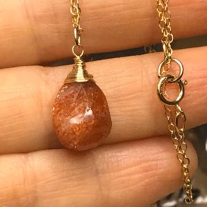 Genuine Sunstone pendant gold necklace, wire wrapped, orange faceted Sun stone jewelry, gemstone Pendant.  Golden Necklace | Natural genuine Sunstone pendants. Buy crystal jewelry, handmade handcrafted artisan jewelry for women.  Unique handmade gift ideas. #jewelry #beadedpendants #beadedjewelry #gift #shopping #handmadejewelry #fashion #style #product #pendants #affiliate #ad