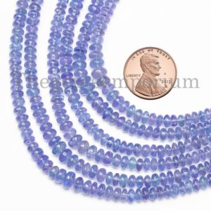 Shop Tanzanite Rondelle Beads! Tanzanite Plain Rondelle Beads, 3-4mm Tanzanite Smooth Beads, Tanzanite Beads, Tanzanite Rondelle Beads Tanzanite Gemstone Beads | Natural genuine rondelle Tanzanite beads for beading and jewelry making.  #jewelry #beads #beadedjewelry #diyjewelry #jewelrymaking #beadstore #beading #affiliate #ad
