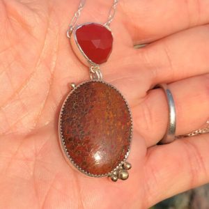 Shop Carnelian Pendants! Fossilized Dinosaur Bone Gemstone Combined with Rose Cut Carnelian Form this One of a Kind Pendant, Set in Sterling Silver, Sterling Chain | Natural genuine Carnelian pendants. Buy crystal jewelry, handmade handcrafted artisan jewelry for women.  Unique handmade gift ideas. #jewelry #beadedpendants #beadedjewelry #gift #shopping #handmadejewelry #fashion #style #product #pendants #affiliate #ad