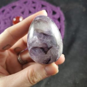 Charoite Egg Crystals Russian Stones Purple Crystal Ball Polished RARE Russia with wood stand | Natural genuine stones & crystals in various shapes & sizes. Buy raw cut, tumbled, or polished gemstones for making jewelry or crystal healing energy vibration raising reiki stones. #crystals #gemstones #crystalhealing #crystalsandgemstones #energyhealing #affiliate #ad