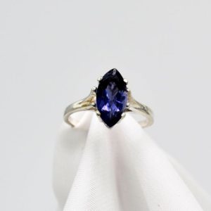 Shop Iolite Rings! Iolite Ring, Genuine Gemstone Marquise Cut 12X6mm 1+ct, Something Blue, Bridal Jewelry, Set in Sterling Silver Four Prong Solitaire Ring | Natural genuine Iolite rings, simple unique alternative gemstone engagement rings. #rings #jewelry #bridal #wedding #jewelryaccessories #engagementrings #weddingideas #affiliate #ad