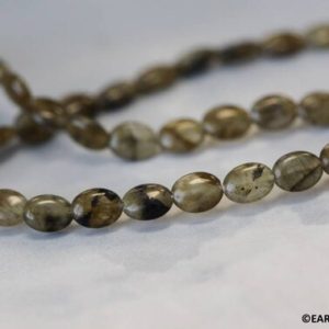 Shop Labradorite Bead Shapes! S-M/ Labradorite 6x8mm/ 8x10mm Flat Oval beads 16" strand Natural gemstone beads for jewelry making | Natural genuine other-shape Labradorite beads for beading and jewelry making.  #jewelry #beads #beadedjewelry #diyjewelry #jewelrymaking #beadstore #beading #affiliate #ad