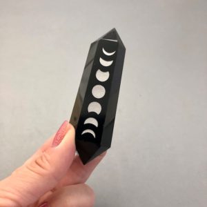 Shop Obsidian Points & Wands! Double Terminated Black Obsidian Point with Silver Moon Phases | Natural genuine stones & crystals in various shapes & sizes. Buy raw cut, tumbled, or polished gemstones for making jewelry or crystal healing energy vibration raising reiki stones. #crystals #gemstones #crystalhealing #crystalsandgemstones #energyhealing #affiliate #ad