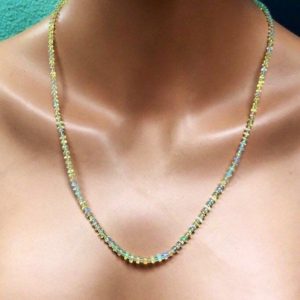 Shop Opal Necklaces! Ethiopian Welo Fire caramel Opal Necklace. Natural gemstone jewelry.  Glowing warm opals. | Natural genuine Opal necklaces. Buy crystal jewelry, handmade handcrafted artisan jewelry for women.  Unique handmade gift ideas. #jewelry #beadednecklaces #beadedjewelry #gift #shopping #handmadejewelry #fashion #style #product #necklaces #affiliate #ad