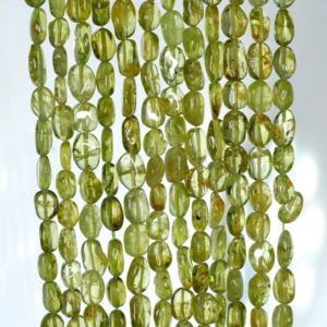 Shop Peridot Chip & Nugget Beads! 6×4-7x5mm Peridot Gemstone Grade A Green Pebble Nugget Loose Beads 14 inch Full Strand (90184956-899) | Natural genuine chip Peridot beads for beading and jewelry making.  #jewelry #beads #beadedjewelry #diyjewelry #jewelrymaking #beadstore #beading #affiliate #ad