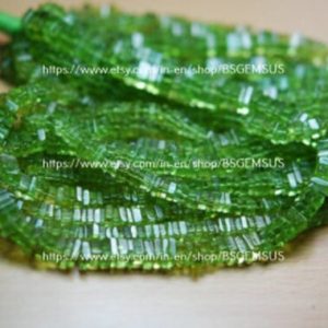 8 Inch Strand, Natural Peridot Heishi Cut Shaped Beads. Size 4-5mm | Natural genuine other-shape Gemstone beads for beading and jewelry making.  #jewelry #beads #beadedjewelry #diyjewelry #jewelrymaking #beadstore #beading #affiliate #ad