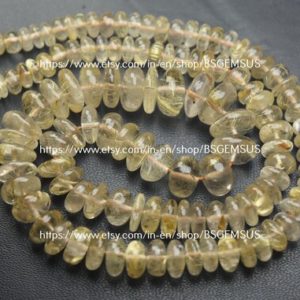 Shop Rutilated Quartz Rondelle Beads! 7 Inches Strand, natural Golden Rutilated Quartz Smooth Rondelle, size 8-6mm | Natural genuine rondelle Rutilated Quartz beads for beading and jewelry making.  #jewelry #beads #beadedjewelry #diyjewelry #jewelrymaking #beadstore #beading #affiliate #ad