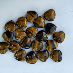 Shop Tiger Eye Shapes! Set of 100 Tiger's Eye Puffy Heart Stone | Natural genuine stones & crystals in various shapes & sizes. Buy raw cut, tumbled, or polished gemstones for making jewelry or crystal healing energy vibration raising reiki stones. #crystals #gemstones #crystalhealing #crystalsandgemstones #energyhealing #affiliate #ad