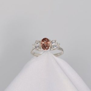 Shop Zircon Rings! Pink Zircon Ring, Genuine Pink Zircon, 7×5 mm 1+ct Oval, 2 5mm Trillion Cut CZ, Set in 925 Sterling Silver Ring | Natural genuine Zircon rings, simple unique handcrafted gemstone rings. #rings #jewelry #shopping #gift #handmade #fashion #style #affiliate #ad