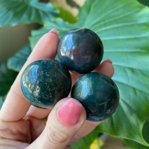 Shop Bloodstone Stones & Crystals! Bloodstone sphere, orb, crystal ball | Natural genuine stones & crystals in various shapes & sizes. Buy raw cut, tumbled, or polished gemstones for making jewelry or crystal healing energy vibration raising reiki stones. #crystals #gemstones #crystalhealing #crystalsandgemstones #energyhealing #affiliate #ad