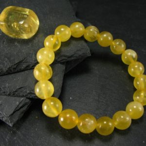 Shop Calcite Bracelets! Yellow Calcite Genuine Bracelet ~ 7 Inches  ~ 10mm  Round Beads | Natural genuine Calcite bracelets. Buy crystal jewelry, handmade handcrafted artisan jewelry for women.  Unique handmade gift ideas. #jewelry #beadedbracelets #beadedjewelry #gift #shopping #handmadejewelry #fashion #style #product #bracelets #affiliate #ad