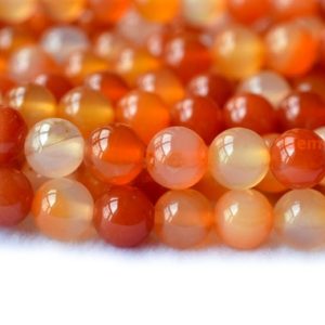 Shop Carnelian Beads! 15.5" 12mm/14mm/16mm natural Carnelian round beads, orange Red gemstone, semi-precious stone beads wholesaler | Natural genuine beads Carnelian beads for beading and jewelry making.  #jewelry #beads #beadedjewelry #diyjewelry #jewelrymaking #beadstore #beading #affiliate #ad