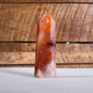 Shop Carnelian Points & Wands! Carnelian Tower | Orange Carnelian Crystal Point | Natural genuine stones & crystals in various shapes & sizes. Buy raw cut, tumbled, or polished gemstones for making jewelry or crystal healing energy vibration raising reiki stones. #crystals #gemstones #crystalhealing #crystalsandgemstones #energyhealing #affiliate #ad