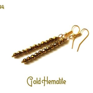 Shop Hematite Earrings! Gold Hematite Earrings, Gold Stick Earrings, Gold Dangle Earrings, Gold Bead Earrings, Gold Hematite Jewelry, Gold Stone Earrings, Hematite | Natural genuine Hematite earrings. Buy crystal jewelry, handmade handcrafted artisan jewelry for women.  Unique handmade gift ideas. #jewelry #beadedearrings #beadedjewelry #gift #shopping #handmadejewelry #fashion #style #product #earrings #affiliate #ad