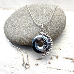 Shop Hematite Pendants! Iron anniversary gift for her. A  gothic style pendant. Hematite is a stone for stress and anxiety. An unusual hematite necklace. | Natural genuine Hematite pendants. Buy crystal jewelry, handmade handcrafted artisan jewelry for women.  Unique handmade gift ideas. #jewelry #beadedpendants #beadedjewelry #gift #shopping #handmadejewelry #fashion #style #product #pendants #affiliate #ad