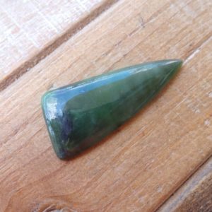 Shop Jade Cabochons! Green Jade Nephrite cabochon | Natural genuine stones & crystals in various shapes & sizes. Buy raw cut, tumbled, or polished gemstones for making jewelry or crystal healing energy vibration raising reiki stones. #crystals #gemstones #crystalhealing #crystalsandgemstones #energyhealing #affiliate #ad