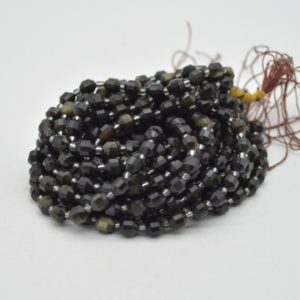 Shop Obsidian Faceted Beads! Grade A Natural Golden Sheen Obsidian Semi-precious Gemstone Double Tip FACETED Round Beads – 5mm x 6mm – 15.5" strand | Natural genuine faceted Obsidian beads for beading and jewelry making.  #jewelry #beads #beadedjewelry #diyjewelry #jewelrymaking #beadstore #beading #affiliate #ad