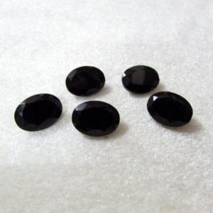 Shop Onyx Shapes! 1 pieces 12x16mm Black Onyx Faceted Oval Loose Gemstone, Black Onyx Oval Faceted Loose Gemstone, Black Onyx Faceted Oval Loose Gemstone | Natural genuine stones & crystals in various shapes & sizes. Buy raw cut, tumbled, or polished gemstones for making jewelry or crystal healing energy vibration raising reiki stones. #crystals #gemstones #crystalhealing #crystalsandgemstones #energyhealing #affiliate #ad