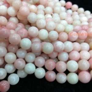 Shop Opal Round Beads! 15.5" Light Pink opal 8mm round beads, pink white gemstone beads,pink color semi-precious stone,Chinese pink Opal 8mm, Gemstone beads supply | Natural genuine round Opal beads for beading and jewelry making.  #jewelry #beads #beadedjewelry #diyjewelry #jewelrymaking #beadstore #beading #affiliate #ad