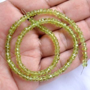 Shop Peridot Faceted Beads! 4.50mm, Green Peridot Beads, Loose Gemstone Peridot Beads, Peridot Faceted Rondelle Beads, Gemstone For Jewelry, 14 Inch Strand | Natural genuine faceted Peridot beads for beading and jewelry making.  #jewelry #beads #beadedjewelry #diyjewelry #jewelrymaking #beadstore #beading #affiliate #ad