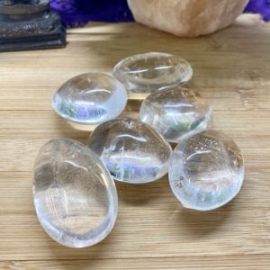 Shop Tumbled Quartz Crystals & Pocket Stones! Clear Quartz Palm stone tumbled polished worry | Natural genuine stones & crystals in various shapes & sizes. Buy raw cut, tumbled, or polished gemstones for making jewelry or crystal healing energy vibration raising reiki stones. #crystals #gemstones #crystalhealing #crystalsandgemstones #energyhealing #affiliate #ad