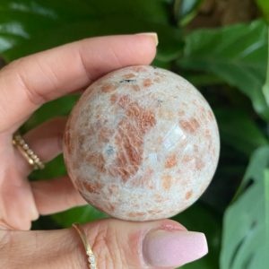 Shop Sunstone Shapes! Sunstone sphere | Natural genuine stones & crystals in various shapes & sizes. Buy raw cut, tumbled, or polished gemstones for making jewelry or crystal healing energy vibration raising reiki stones. #crystals #gemstones #crystalhealing #crystalsandgemstones #energyhealing #affiliate #ad