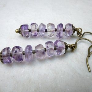 Shop Amethyst Earrings! Rustic Amethyst Dangle Earrings, purple and gold amethyst crystal and antiqued brass Bohemian jewelry, February birthstone | Natural genuine Amethyst earrings. Buy crystal jewelry, handmade handcrafted artisan jewelry for women.  Unique handmade gift ideas. #jewelry #beadedearrings #beadedjewelry #gift #shopping #handmadejewelry #fashion #style #product #earrings #affiliate #ad