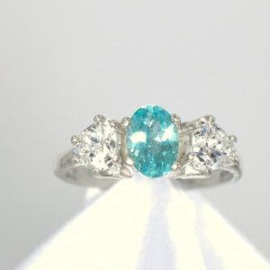 Shop Apatite Rings! Apatite Ring, 7×5 mm Genuine Gemstone Faceted Oval Shape, 2-5mm CZ Trillions, Set in 925 Sterling Silver Fancy Shank Mounting | Natural genuine Apatite rings, simple unique handcrafted gemstone rings. #rings #jewelry #shopping #gift #handmade #fashion #style #affiliate #ad