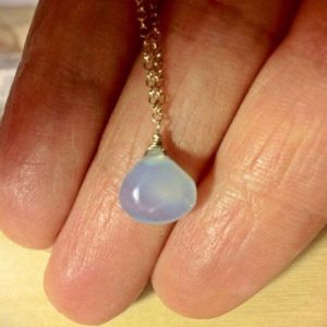 Shop Blue Chalcedony Jewelry! Blue Chalcedony pendant Gold Necklace.  Pale blue drop.  Tiny blue stone.  Milky white.  Gemstone Delicate jewelry. | Natural genuine Blue Chalcedony jewelry. Buy crystal jewelry, handmade handcrafted artisan jewelry for women.  Unique handmade gift ideas. #jewelry #beadedjewelry #beadedjewelry #gift #shopping #handmadejewelry #fashion #style #product #jewelry #affiliate #ad