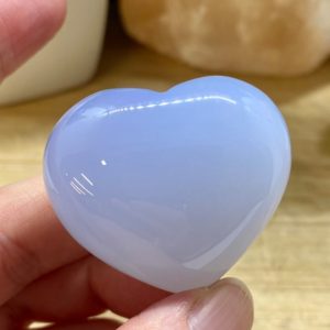 Blue Chalcedony heart polished  sculpture crystal | Natural genuine stones & crystals in various shapes & sizes. Buy raw cut, tumbled, or polished gemstones for making jewelry or crystal healing energy vibration raising reiki stones. #crystals #gemstones #crystalhealing #crystalsandgemstones #energyhealing #affiliate #ad