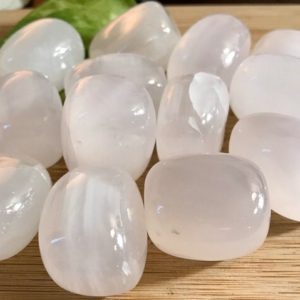 Shop Calcite Stones & Crystals! Tumbled Pink Mangano Calcite Stones Gift Bag fluorescent fluorescence | Natural genuine stones & crystals in various shapes & sizes. Buy raw cut, tumbled, or polished gemstones for making jewelry or crystal healing energy vibration raising reiki stones. #crystals #gemstones #crystalhealing #crystalsandgemstones #energyhealing #affiliate #ad
