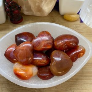 Shop Tumbled Carnelian Crystals & Pocket Stones! Carnelian Hearts tumbled Stone crystal | Natural genuine stones & crystals in various shapes & sizes. Buy raw cut, tumbled, or polished gemstones for making jewelry or crystal healing energy vibration raising reiki stones. #crystals #gemstones #crystalhealing #crystalsandgemstones #energyhealing #affiliate #ad